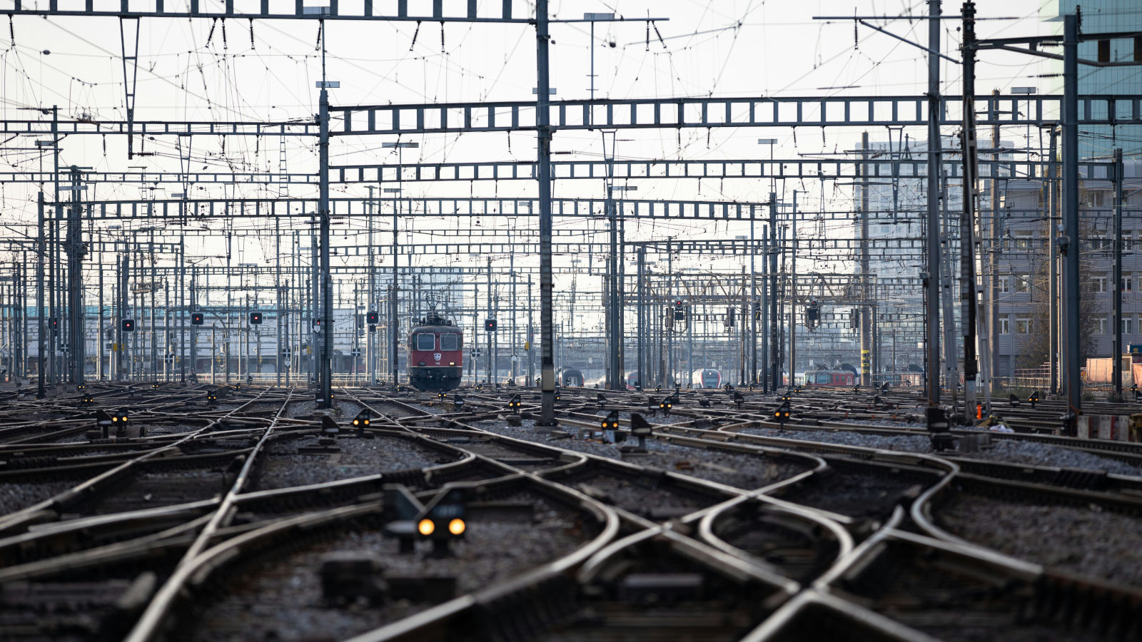 Train in the middle of a wide railway network
